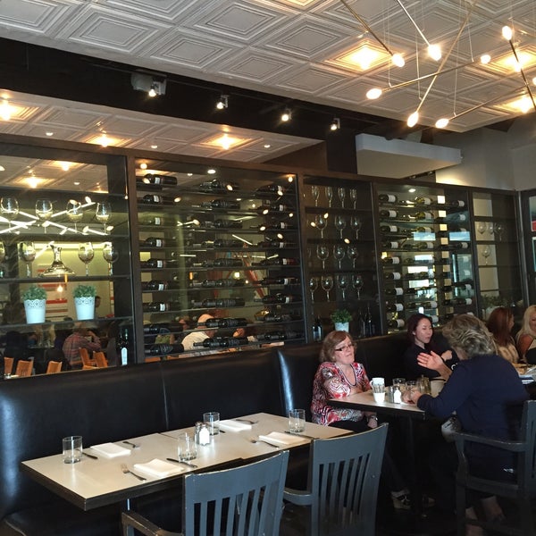 Photo taken at Oliver &amp; Bonacini Café Grill, Bayview Village by Romil R. on 5/11/2015