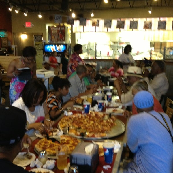 Photo taken at Pizza Shuttle by Jordan R. on 6/12/2013