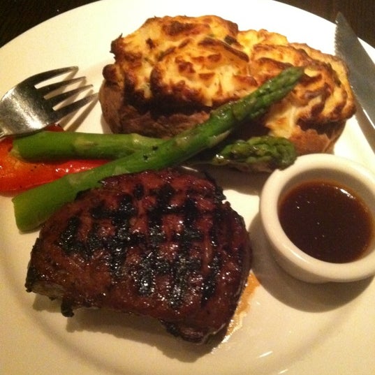 Photo taken at The Keg Steakhouse + Bar - Esplanade by Alan F. on 1/17/2012