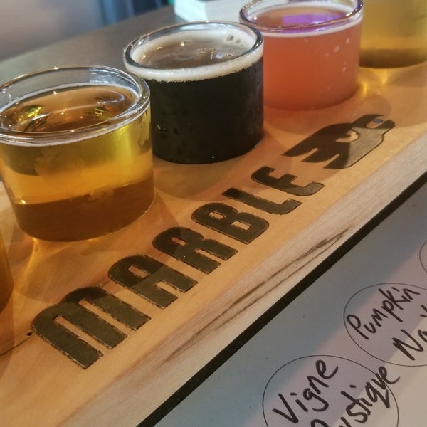 Photo taken at Marble Brewery by Angela C. on 8/28/2021