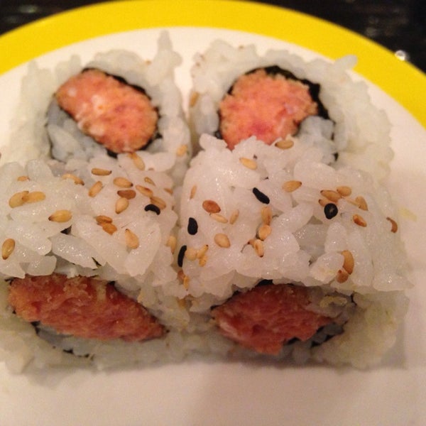 Photo taken at Sushi + Rotary Sushi Bar by K C. on 8/17/2014