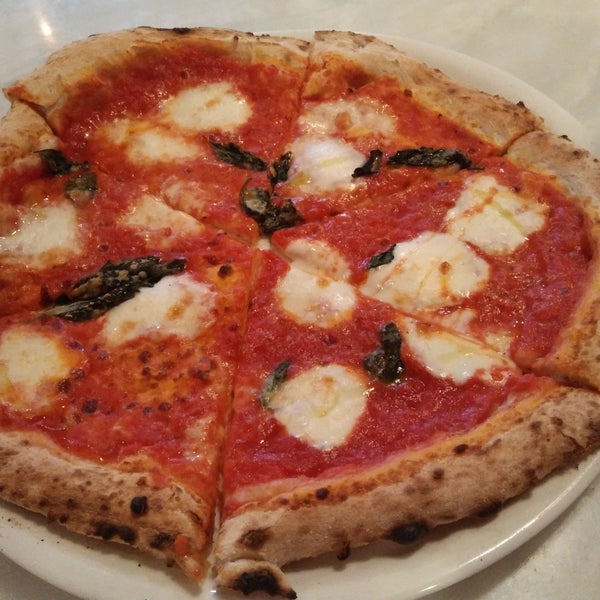 Margherita Pizze was great! I enjoyed the simplicity of the topping, seeing more red than yellow (more tomato than cheese). Cheese was so well-cooked that I pulled as I bit it. I LOVE their crust too!