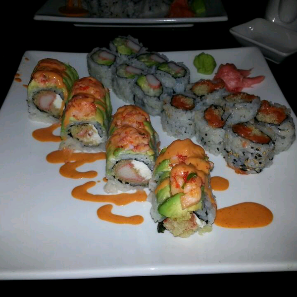 Combo meal with passion roll, California roll, crunchy spicy salmon roll.