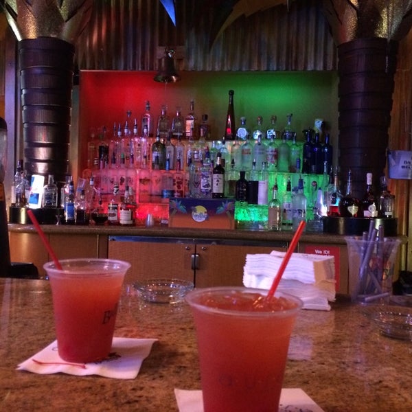 Photo taken at Rum Bullions Island Bar by Diena R. on 6/30/2014