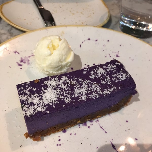 Photo taken at Romulo Café &amp; Restaurant by Vanessa L. on 12/10/2018