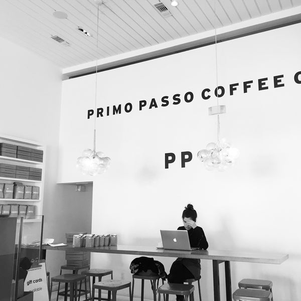 Photo taken at Primo Passo Coffee Co. by Chris K. on 1/13/2016