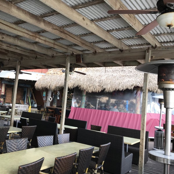 Foto diambil di Sharky&#39;s Beachfront Restaurant oleh Tom M. pada 12/15/2018