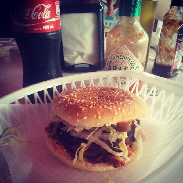 Photo taken at PicNic Burger Grill by Juan M. on 3/16/2013