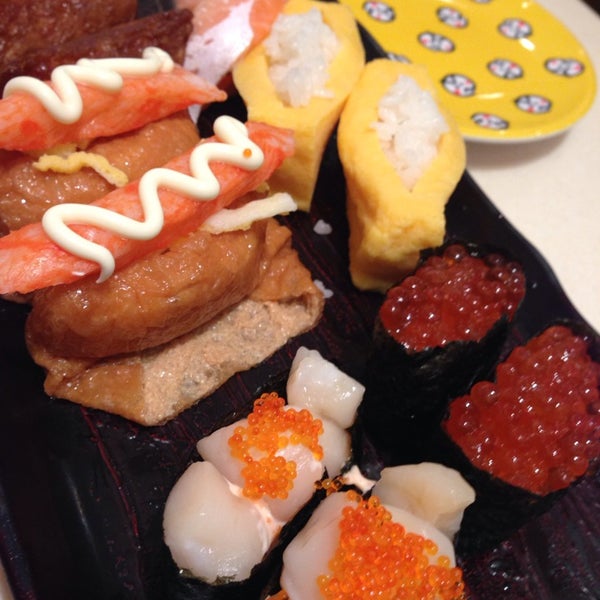 Photo taken at Genki Sushi by Thomas N. on 2/16/2014