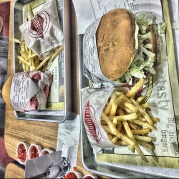 Photo taken at Fatburger by O F. on 10/1/2013