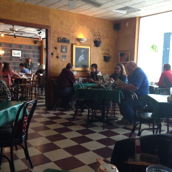 Photo taken at Charleston&#39;s Cafe by Katie B. on 5/4/2013