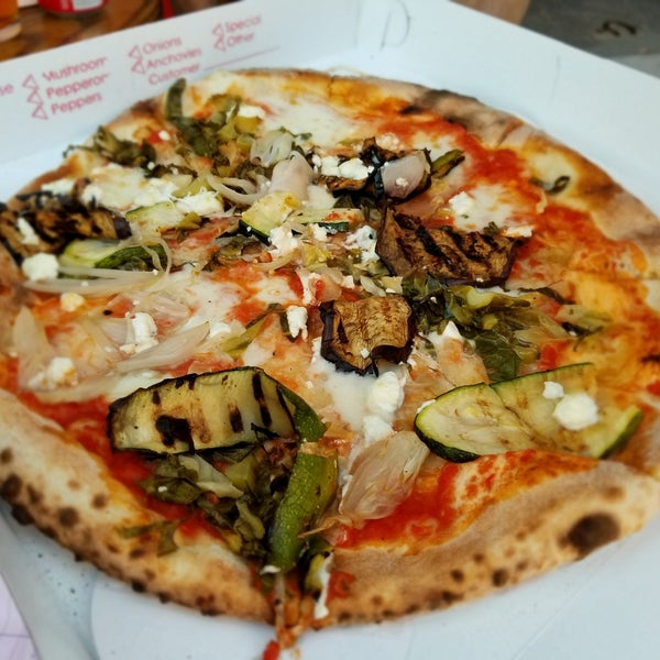 Wood fired oven pizza by the pie.  Get the Houdini Green pie, the goat cheese makes this veggie pie delicious.  You can take your pie to go and drink craft beers at nearby Bridge & Tunnel.  Cash only.