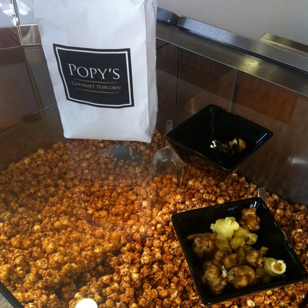 Foto tirada no(a) Popy&#39;s Gourmet Popcorn por Daphnia N. em 3/29/2014