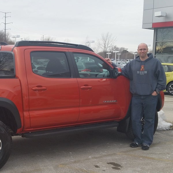 Russell Sauers and his 2016 Toyota Tacoma- He flew in from VA to get his dream Toyota truck from Andrew Toyota Scion!