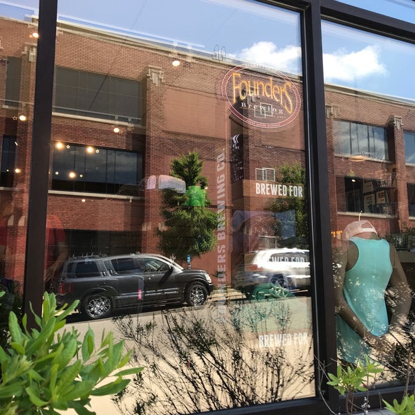 Photo taken at Founders Brewing Company Store by Benjamin E. on 6/7/2019
