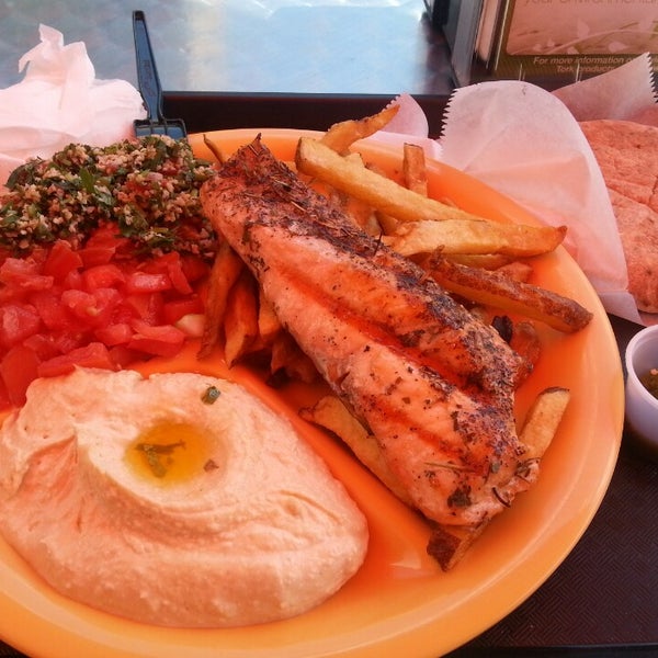 Photo taken at Hummus Grill by Alberto J. on 8/4/2013