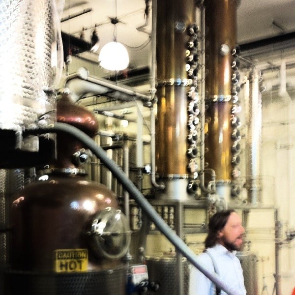 Photo taken at New Columbia Distillers by Gaurav P. on 2/8/2014
