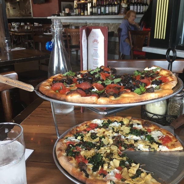 Photo taken at Campania Coal Fired Pizza by Natalie S. on 8/31/2019