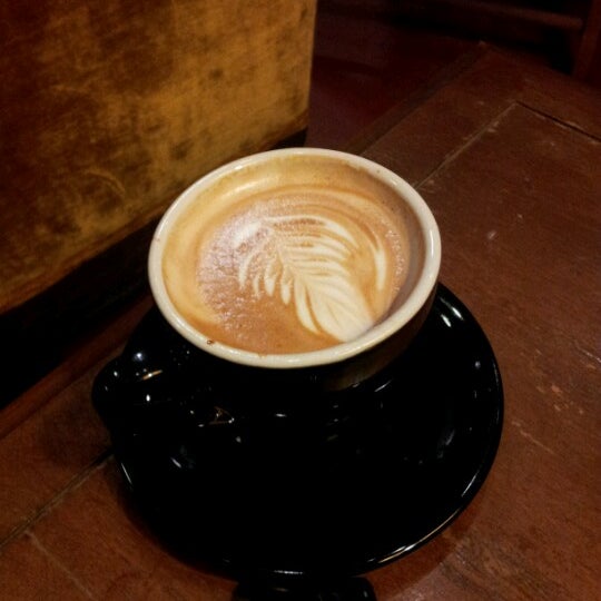 Photo taken at The Palace Coffee Company by Adam W. on 10/25/2012