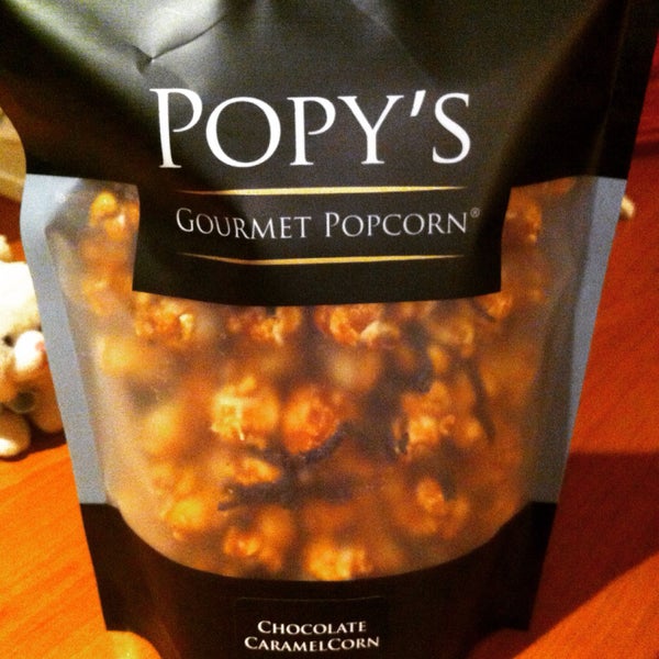 Foto tirada no(a) Popy&#39;s Gourmet Popcorn por Tereza K. em 10/31/2015