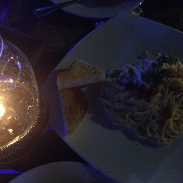 Photo taken at Aquatini Riverside Restaurant &amp; Bar by Leng O. on 12/25/2013