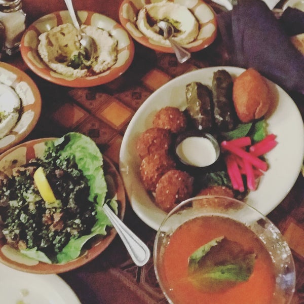 Get the metzah platter for two and share as a table, it's awesome and gives you a ton of options like fallafel and stuffed grape leaves to try!