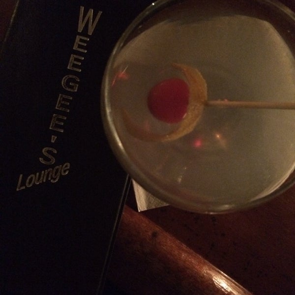 Photo taken at Weegee&#39;s Lounge by Amanda S. on 3/17/2014
