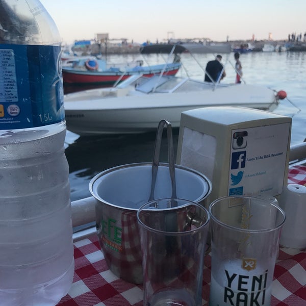 Photo taken at Assos Yıldız Balık Restaurant by Gökhan S. on 8/12/2017