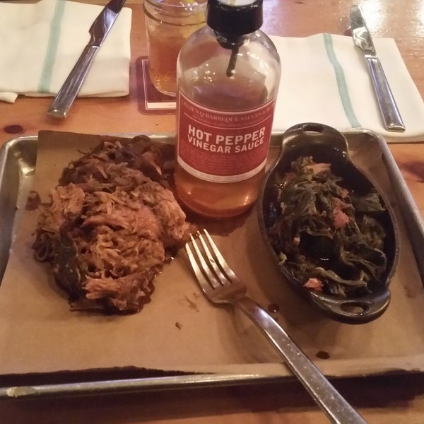 Half pound of BBQ pulled pork with side of collard greans.