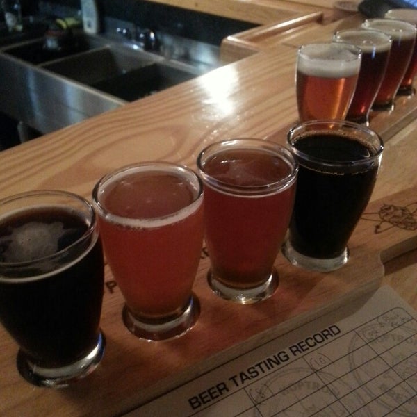 Photo taken at Hoptron Brewtique by George M. on 3/16/2013