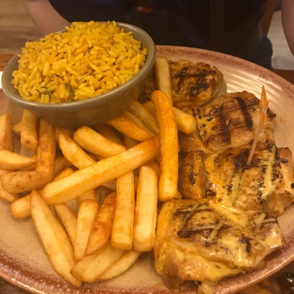 Photo taken at Nando&#39;s by Maria H. on 6/9/2017