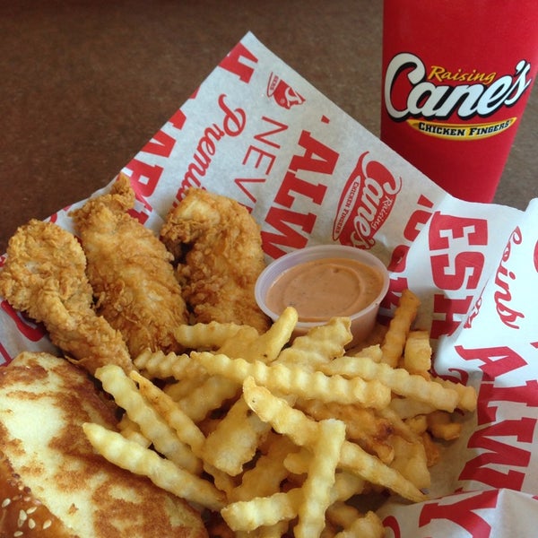 Photo taken at Raising Cane&#39;s Chicken Fingers by Laci L. on 4/28/2014