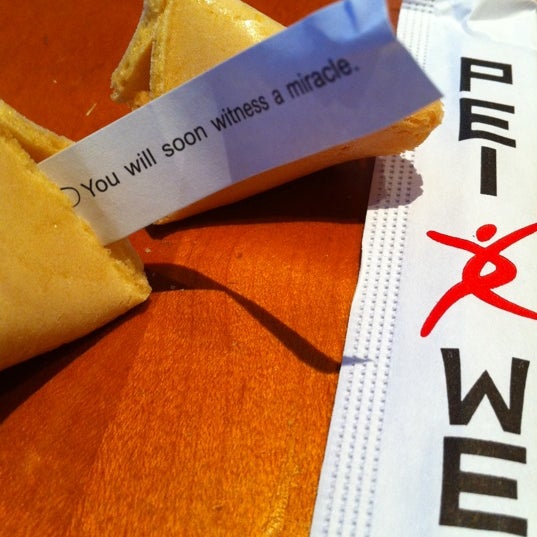 Read the cookie's fortune out loud to the table, ending with the phrase "in bed".