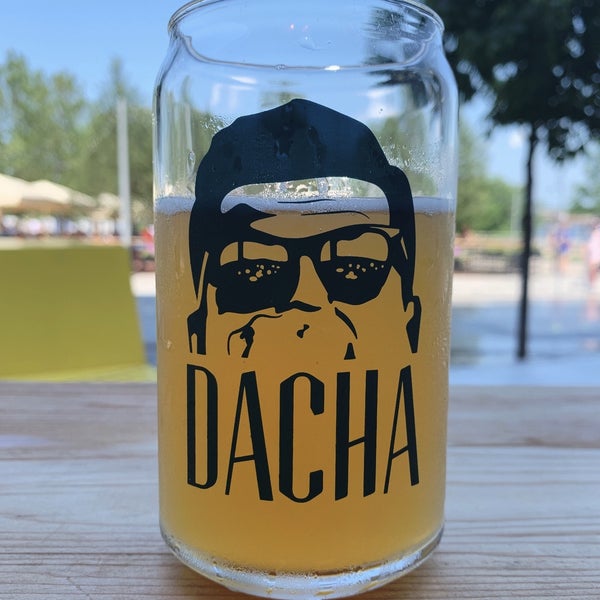 Photo taken at Dacha Beer Garden by Brian C. on 5/25/2019
