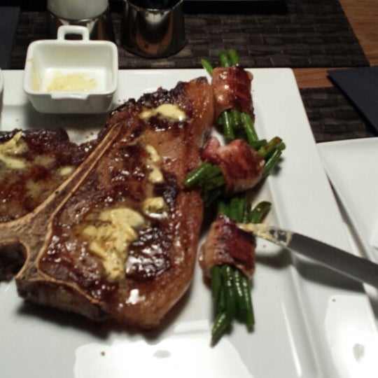 Photo taken at Tower 66 Steakhouse &amp; Bar by Kris K. on 1/23/2014