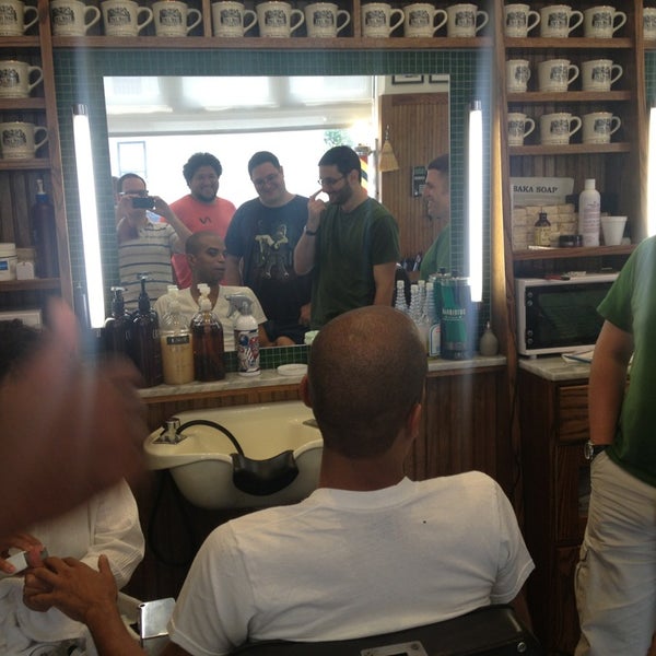Photo taken at Paul Mole Barber Shop by Sam T. on 8/31/2013