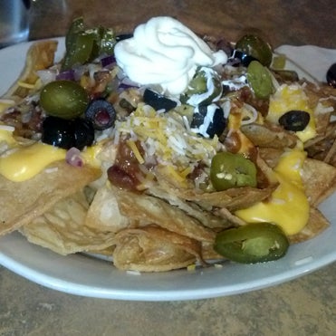 The homemade tortilla chips makes their "famous" line of nachos worth a try, just ask for extra cheese!