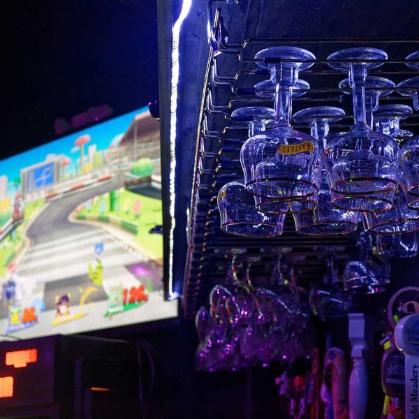 Trade in gaudy mascots and brightly-colored amusement parks for a whole other level of flashy, pixel-riddled entertainment at Player1, where craft beer is the main attraction.