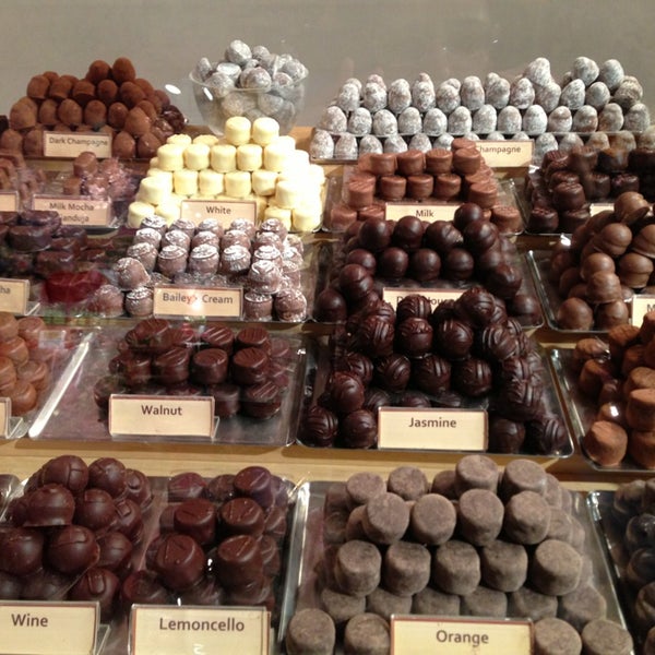 Photo taken at teuscher Chocolates - Rockefeller Center by Mayara S. on 2/5/2013