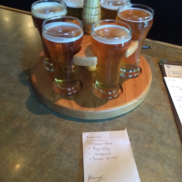 Photo taken at Cascade Lakes Brewing by Andrew F. on 6/7/2015