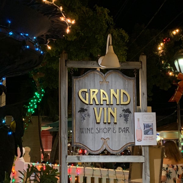 Photo taken at Grand Vin Wine Shop &amp; Bar by Michael Z. on 12/5/2019