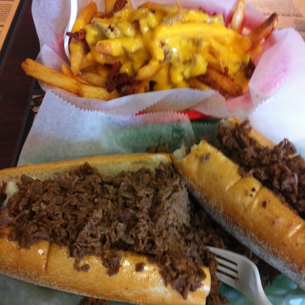 Photo taken at Pudge&#39;s Steaks and Hoagies by Adrian H. on 5/8/2013