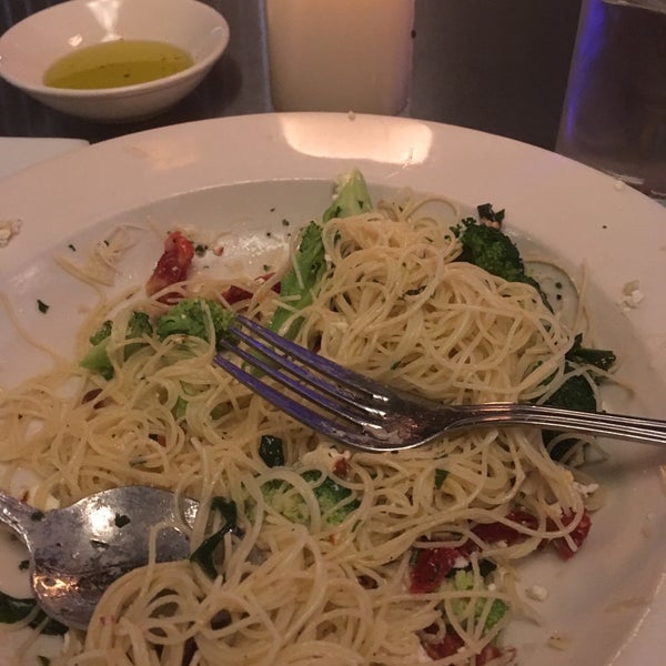 You cannot go wrong with the Capellini Alla Campagnola and glass of house red.