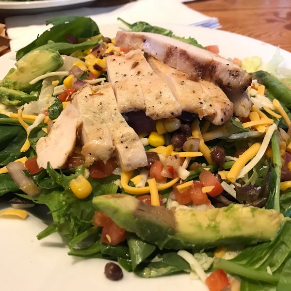 Grilled chicken salad with avocado.