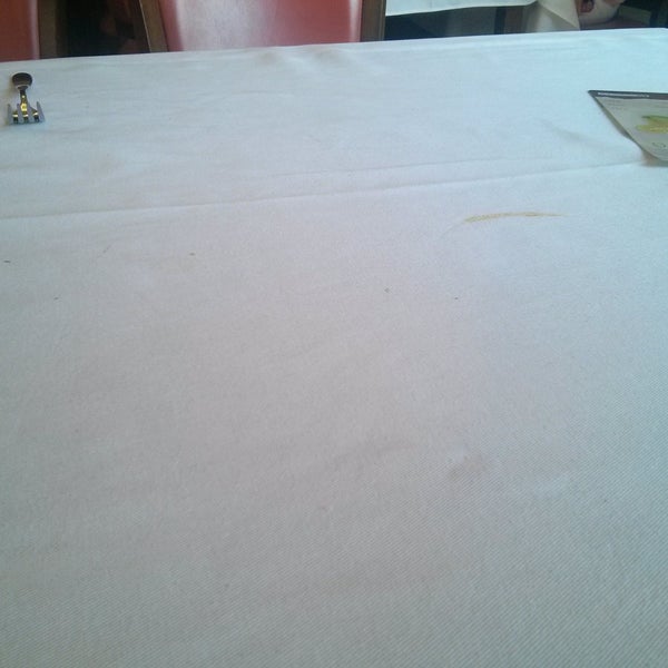 Dirty table cloth and crumbs all over the table. Not quite suited for the high prices they have.