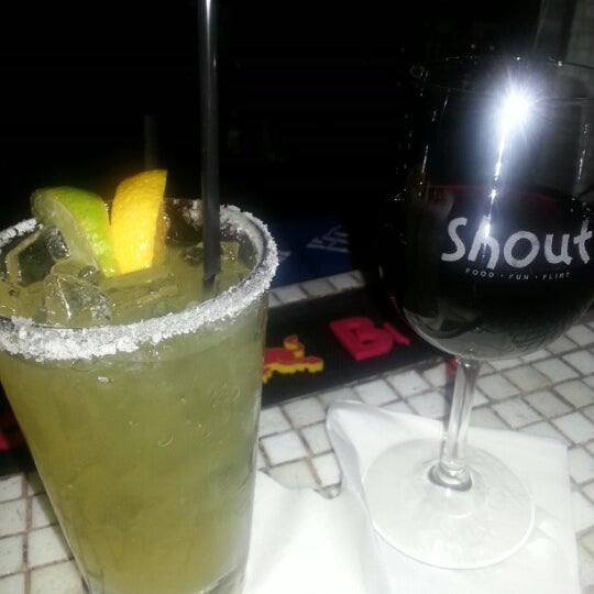 Photo taken at Shout! Restaurant &amp; Lounge by Tyronza M. on 10/7/2012