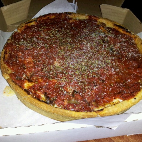 Photo taken at Kylie&#39;s Chicago Pizza by Meee M. on 11/28/2012