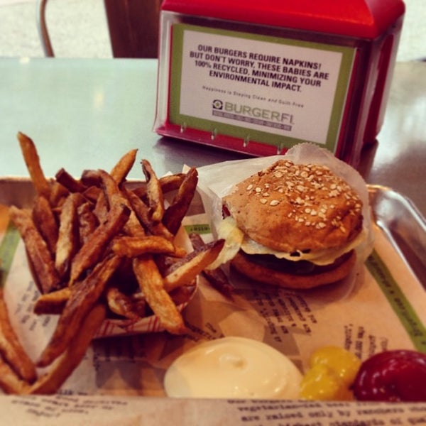 Photo taken at BurgerFi by B P. on 5/4/2014