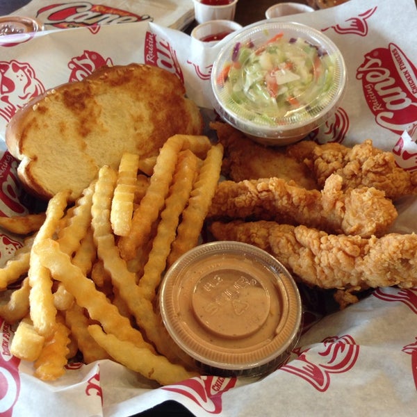 Photo taken at Raising Cane&#39;s Chicken Fingers by Carrie Rose S. on 10/27/2013