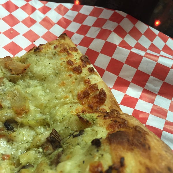 Try the chicken pesto pizza. Open late night